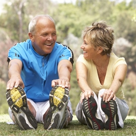 man and woman exercising