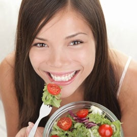 woman eating a salad