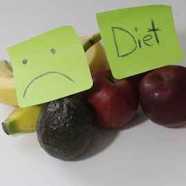 fruit with sad sticker and diet sticker