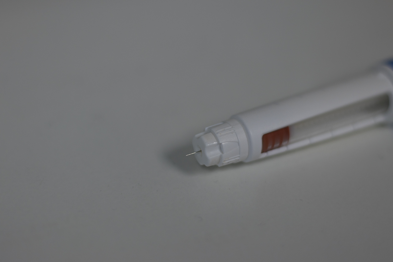 ozempic pen with needle showing for weight loss injection